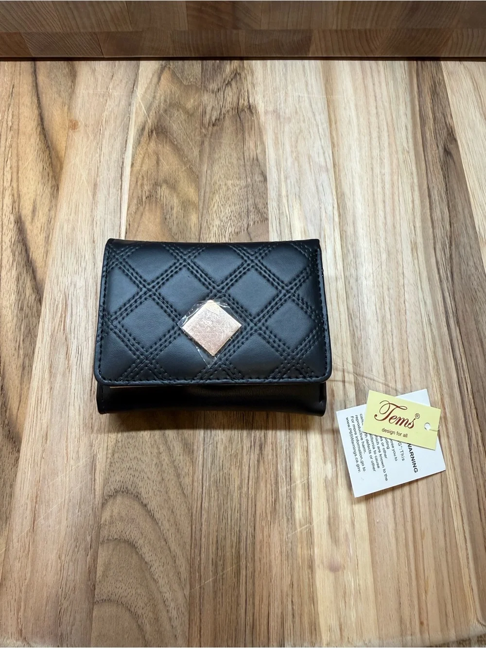 Quilted Black Leather Mini Wallet with Square Gold Emblem